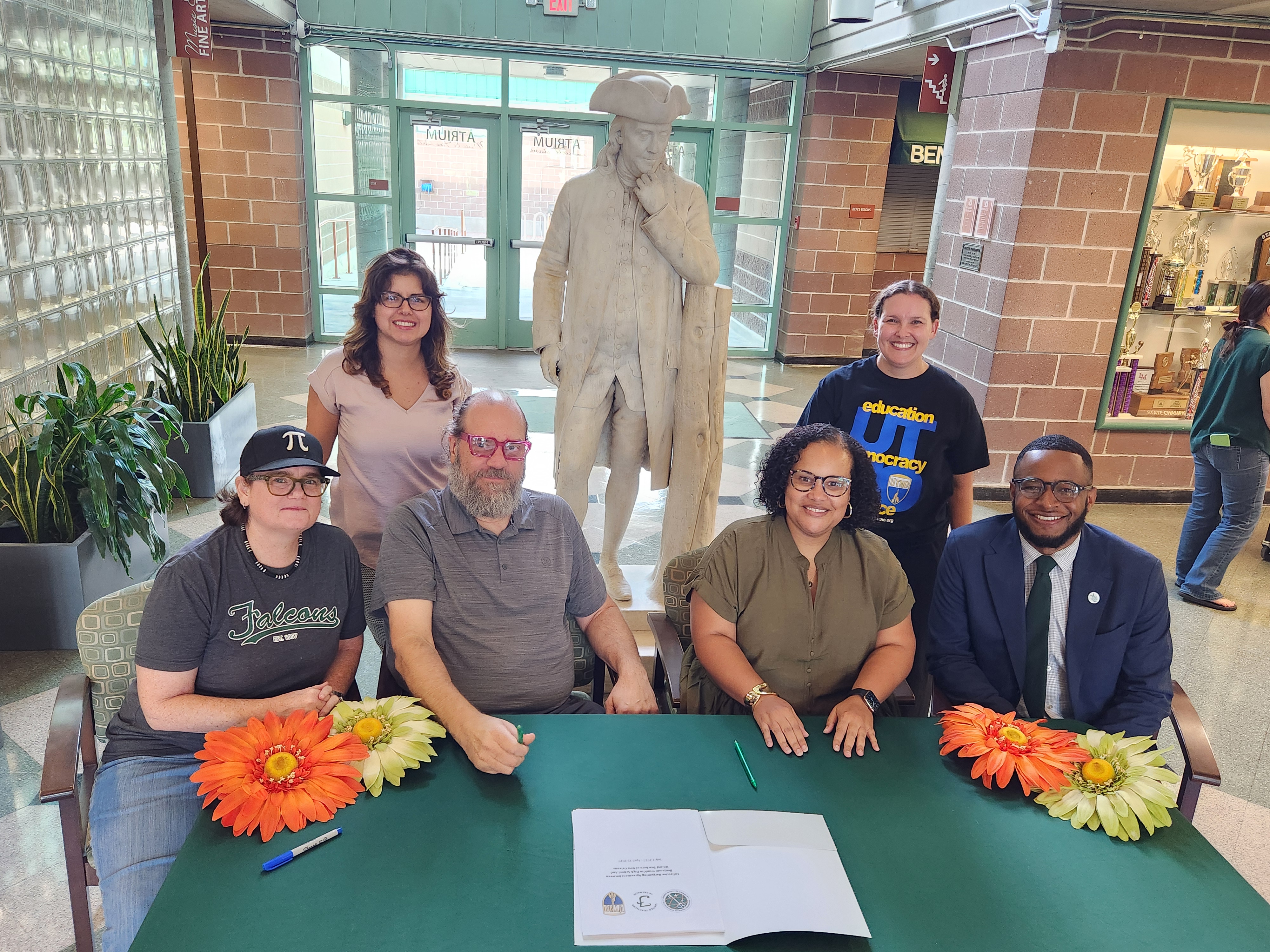 Representatives of the United Teachers of Franklin, United Teachers of New Orleans, Advocates for Academic Excellence in Education, Ben Franklin High School management at the signing of their 4th Collective Bargaining Agreement on August 8, 2025